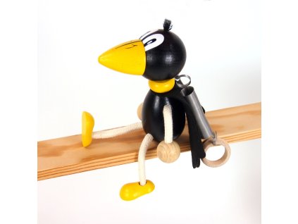 raven wooden bounicng figure