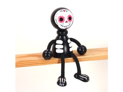 wooden sitting figure los muertos