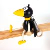 raven wooden bounicng figure